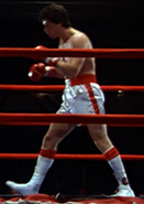 Rocky in The Superfight against Apollo Creed, white and red costume, seen in Rocky.