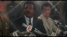 Rocky with Apollo at the press conference for Creed upcoming fight with Ivan Drago
