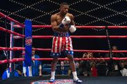Adonis Creed wearing the classic American Costume during his fight against Danny Wheeler for the Heavyweight Champion, seen in Creed II.