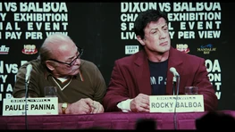 Rocky at the press conference with Paulie and Duke (not pictured)  for his upcoming fight against Dixon