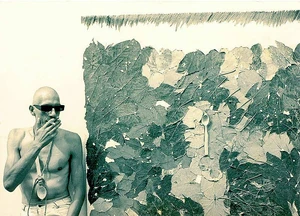 Mugur Grosu posing in 1998 in front of his artwork Indian Summer (Photo: Lavinia Hanachiuc)