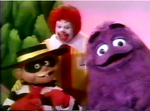 Grimace with Ronald McDonald and Hamburglar in "The Day Birdie, the Early Bird learned how to fly".