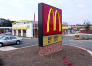 In 1996 McDonald's introduced the Eyebrow exterior with yellow and orange striped onnings.