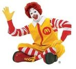 Ronald McDonald wave legs crossed