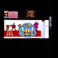 A Playplace doorway showing a banner of McDonaldland characters.