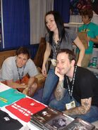 Becca with Joel, Geoff and Gavin in the RT Booth at Comic Con 2007