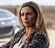 Ann Evans portrayed by Claudia Black