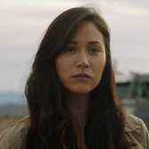 Tezca portrayed by Brigitte Kali Canales