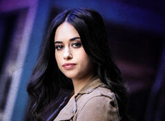 Liz portrayed by Jeanine Mason