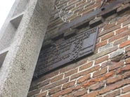 Plaque de cocher sur la D22 à La Chapelle-aux-Pots.