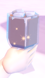 A hand holding the item Iced Vanilla Latte.