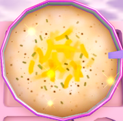 A bowl of potato cheese soup.