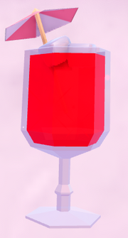 A glass of cherry punch with a paper umbrella.