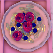A bowl of muesli with raspberries and blueberries.