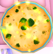 A bowl of broccoli cheddar soup.