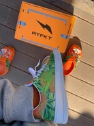 A physical pair of the RTFKT "META HAZE 420" colorway.