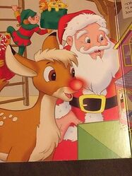 One of the book's pages featuring Rudolph and Santa