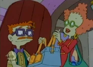 "Here's his diaper bag and his toys, and his extra bottles,"