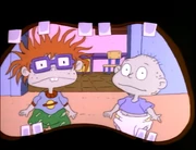 Lil's only In-The-Mouth-Camera Shot. Seems like the show had also mistook her as being Phil without the bow.