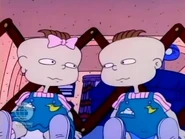 Phil and Lil look at each other when they notice that Tommy looks different today