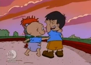 Tommy tickles the Bully's armit to get him to lose his grip on Cheddar's cage