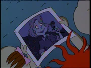The kids discover the photo of Chuckie's mom.