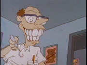 Dr. Homer about to check on Tommy's first tooth.