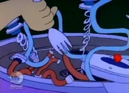 ...which he uses to break the mechanism on the Baby Suspenders...