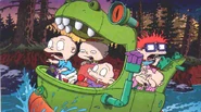The gang in the Reptar Wagon, travelling in the river.