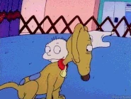 Tommy takes off his shirt