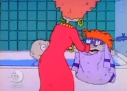 As Didi takes Chuckie away to dry him off...