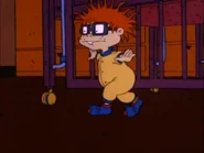 Chuckie rushes out of his crib to check the traps...
