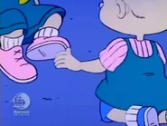 Phil helps Lil take off her shoe