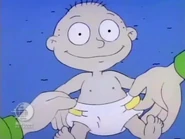 Stu puts Tommy's diaper back on one last time