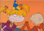 "Listen up, Dummy, this may be your birthday, but when the presents are open, I get first dibs on the toys!"