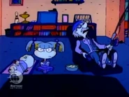Both Tommy and Lou have fallen asleep while Angelica watches Fishing With Stan and Orville.