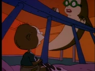 Tommy hallucinates that Didi is the moon of his mobile