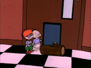 Tommy and Chuckie block off the dog door