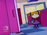 Angelica holding a plate near her father, while Charlotte's buzzer is heard blaring off
