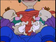 Betty feeding newborn Phil and Lil.