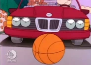 Angelica puts the brakes on when she sees a basketball in the sidewalk