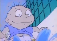 Tommy jumps and splashes water, revealing that he and Chuckie are in the bathtub