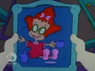 Tommy finds a picture of Didi as a toddler