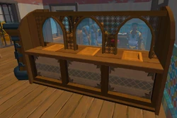 Bankers are usually located in an inaccessible area behind the desk.