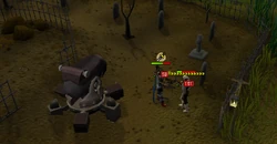 A player using a  to fight Dessous.