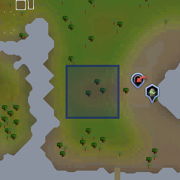 The slab is due west of the Cave Horror cave entrance.