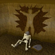 The remains of the adventurer that woke Elvarg.