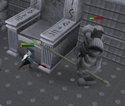 A player safespotting the statue using a .