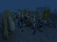 The last trainee In Varrock, oddly not seeing his city is under attack.