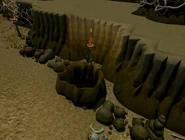 The tunnel leading to the baby black dragon